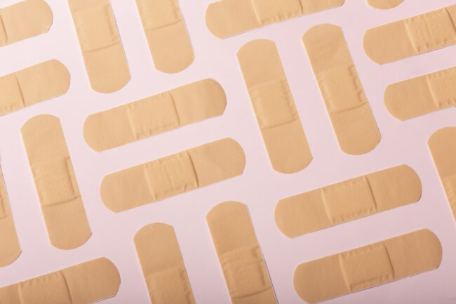 protection-concept-with-band-aid | Image by freepik.com